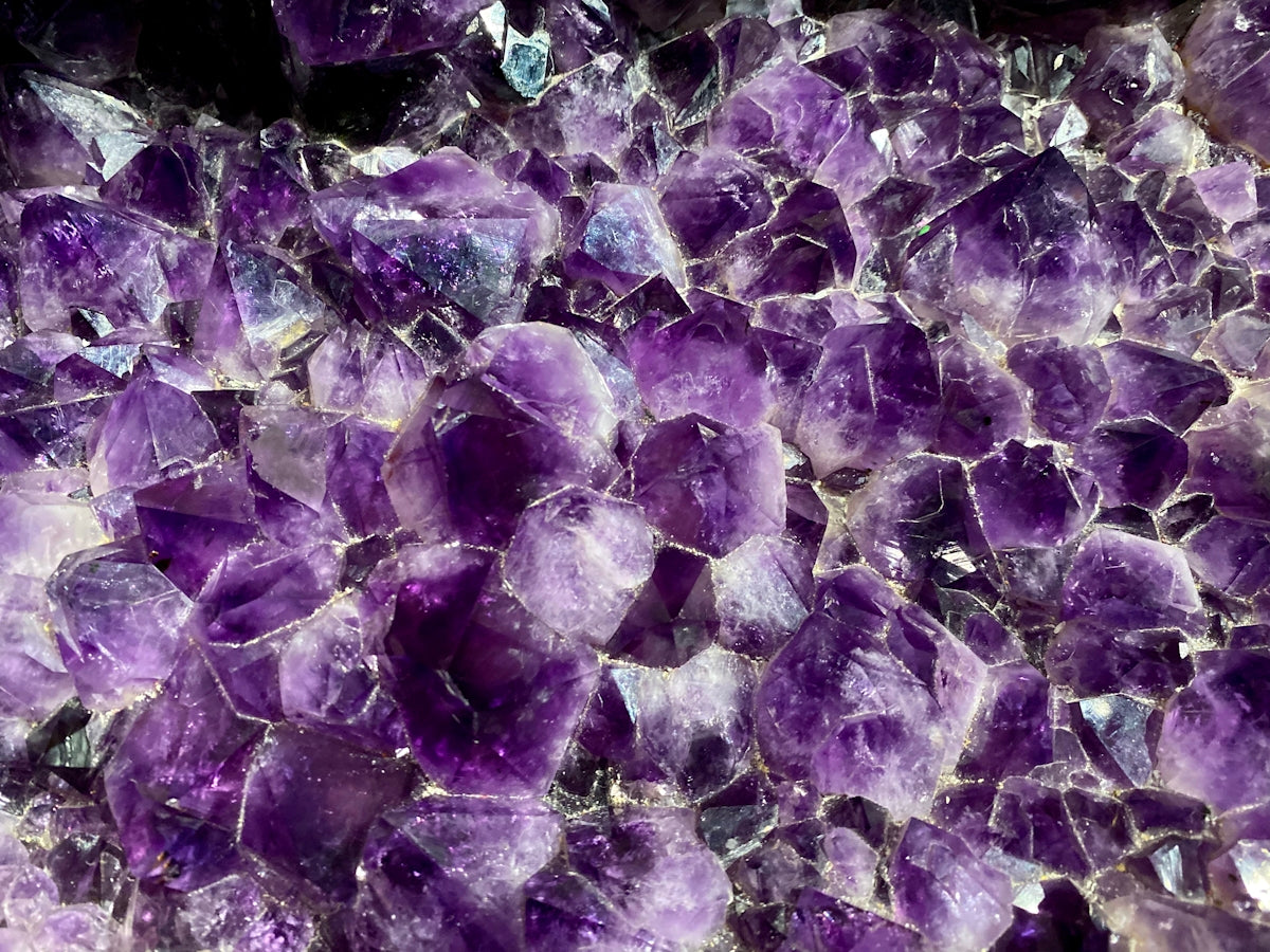 a close up of a bunch of purple rocks