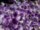 a close up of a bunch of purple rocks